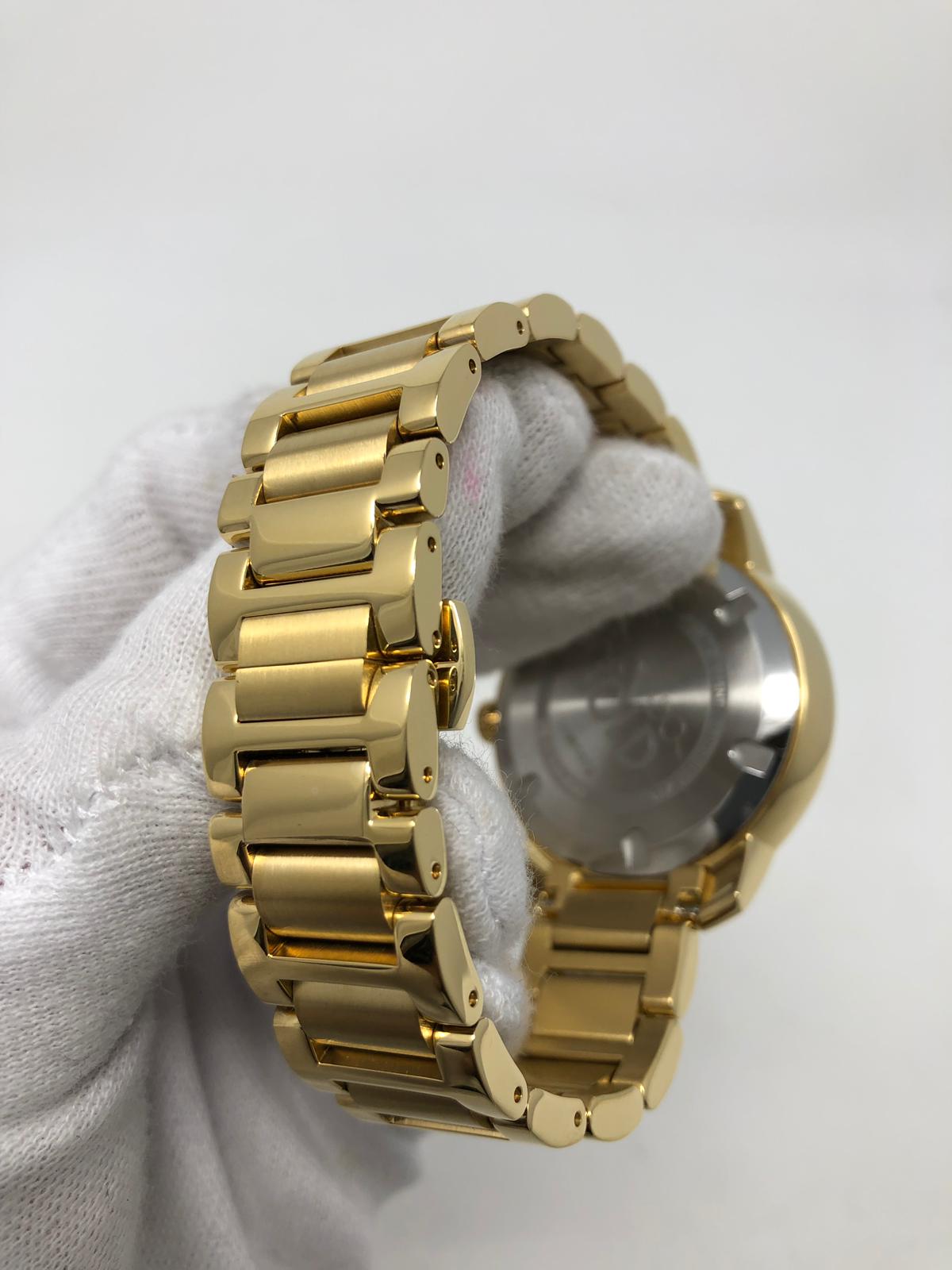 Movado Bold Swiss Roman Numerals Gold Dial Gold Tone Unisex Watch ...